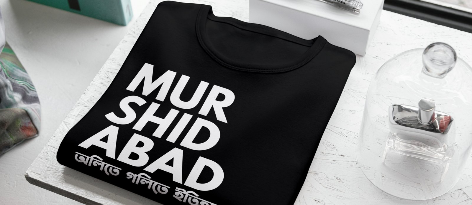 Model wearing statement T-shirt and accessories showcasing bold streetwear look